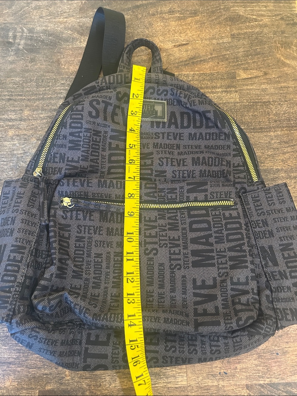 Steve Madden Black Logo-Print Backpack with Gold Zippers